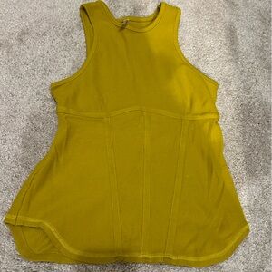 Free people mustard color top. Size M